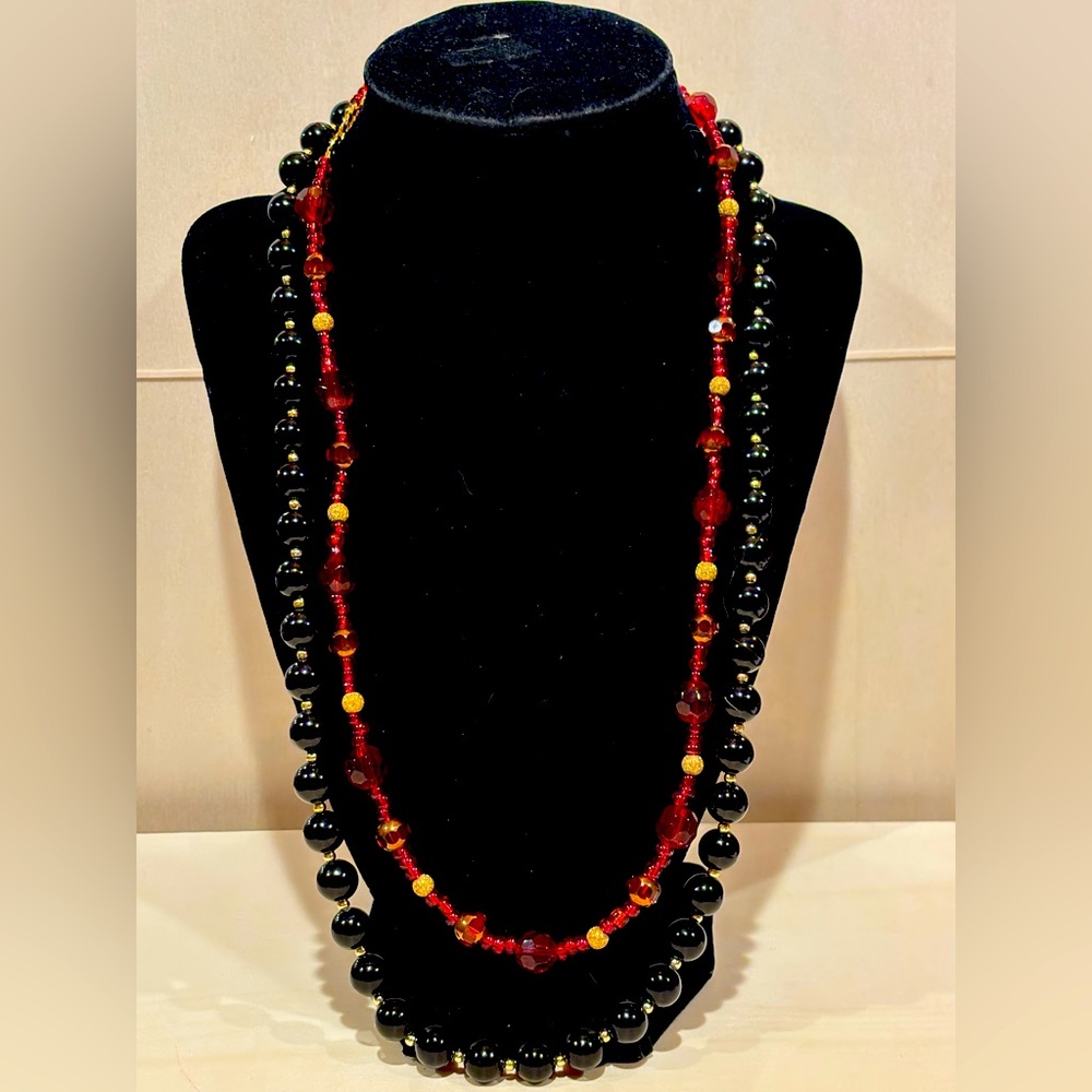 Bundle of 2 necklaces red glass bead and black acrylic beads.
